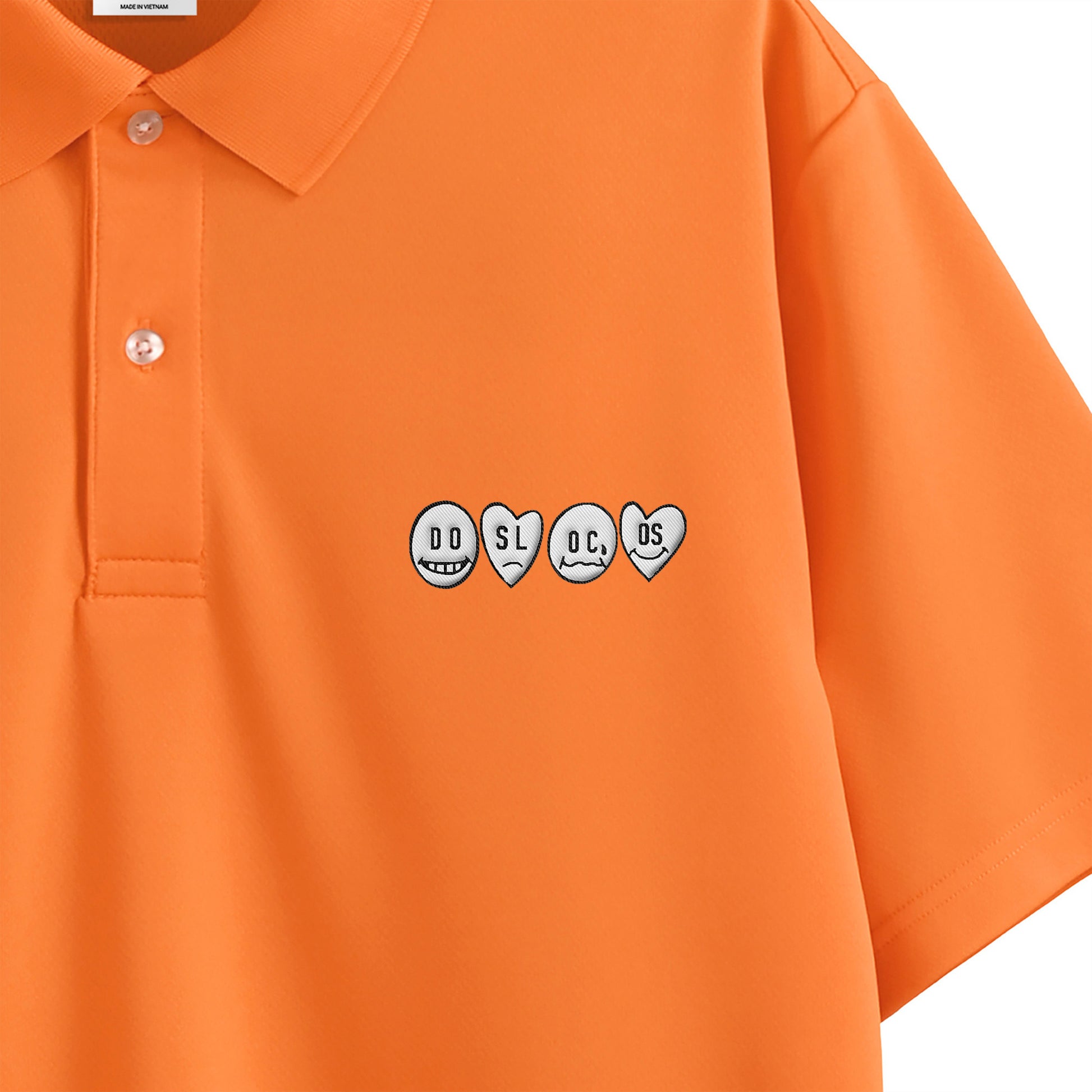 ポロシャツ　ニコちゃん orange image