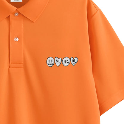 ポロシャツ　ニコちゃん orange image